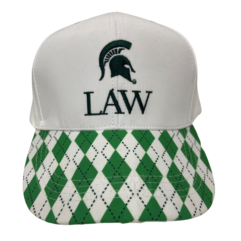 A ball cap with a white base that includes the MSU Spartan helmet logo and the word Law in all caps underneath. The bill of the cap has a green and white diamond pattern. 