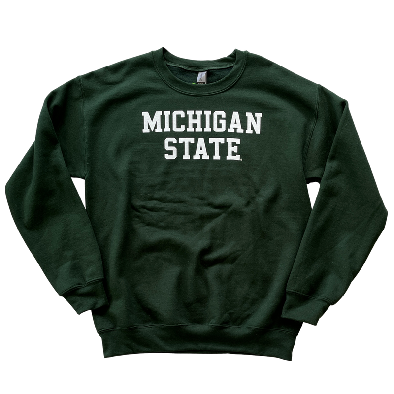 Dark green crewneck sweatshirt. Across center chest, white block letters read "Michigan State"