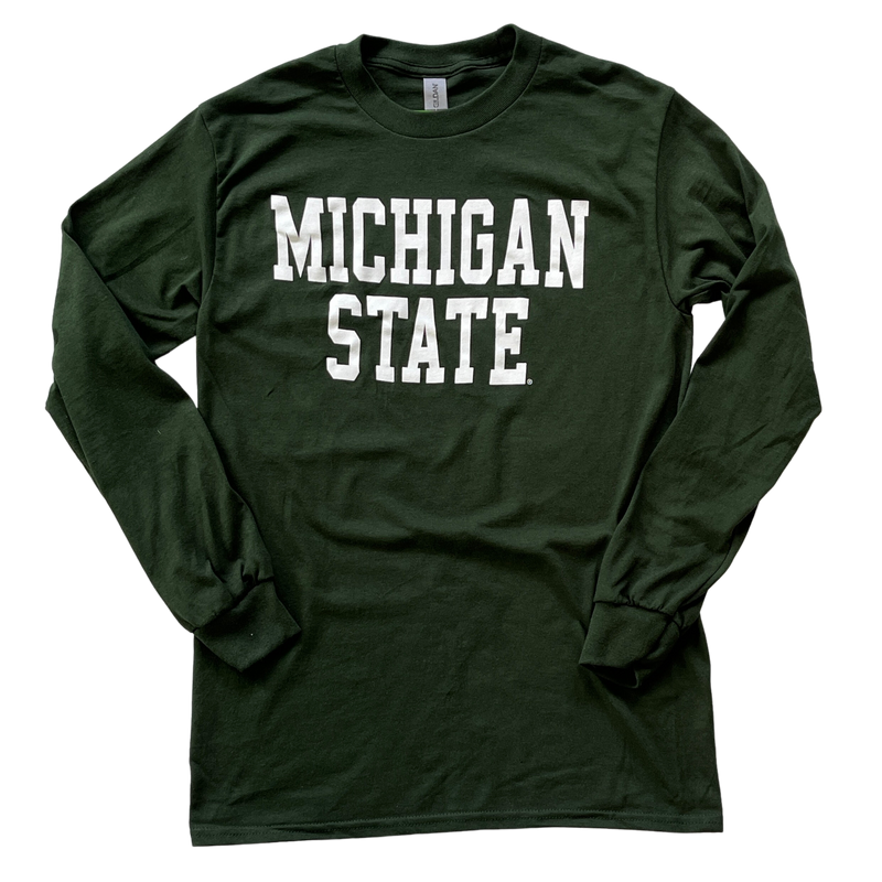 Dark green crewneck, long-sleeve t-shirt. Across center chest, white block letters read "Michigan State"