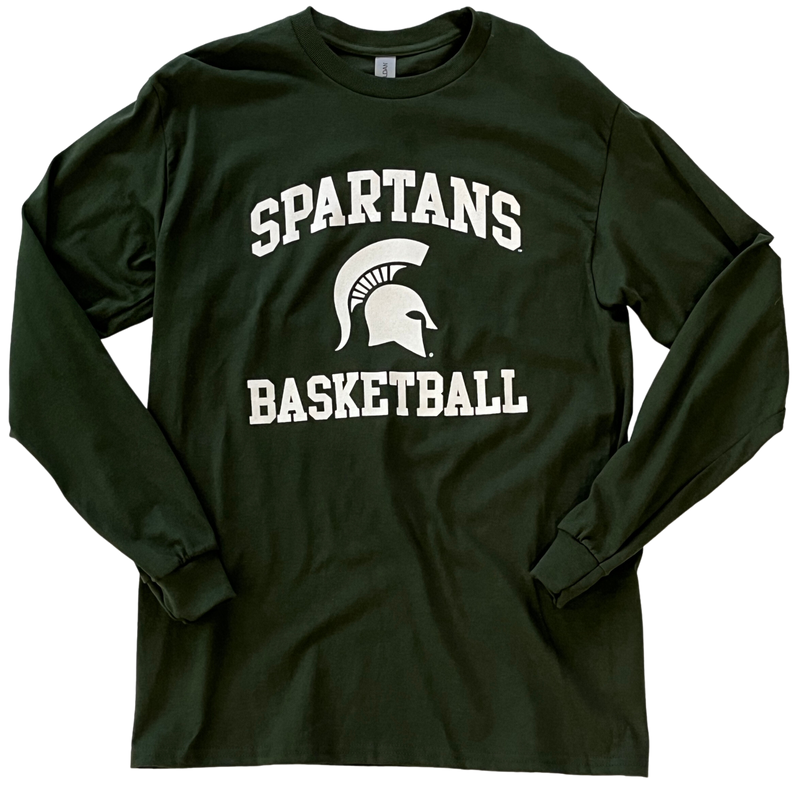 Forest green long-sleeve t-shirt with white printing centered on the torso. Around a Spartan helmet is two lines of block text: a curved line above reading Spartans and a straight line below reading Basketball