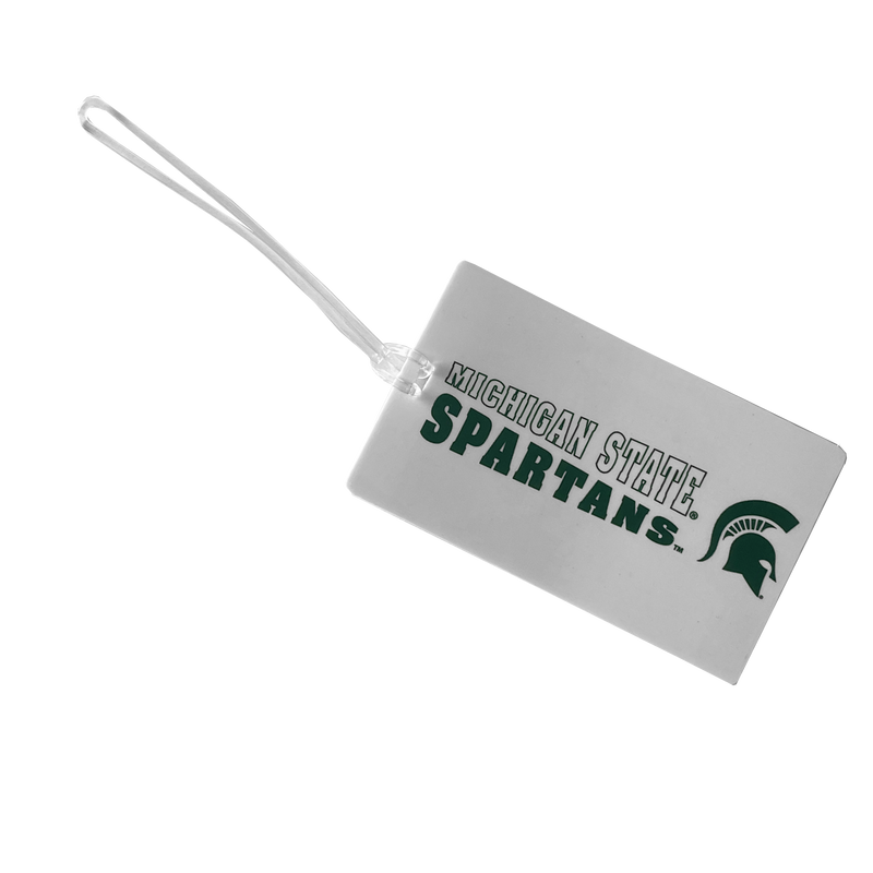 A white, rectangular luggage tag with a clear strap. The words "Michigan State Spartans" in a collegiate font are displayed in a slanted style, with "Michigan State" in white on top and "Spartans" in dark green on the bottom. To the right is a dark green Spartan helmet.