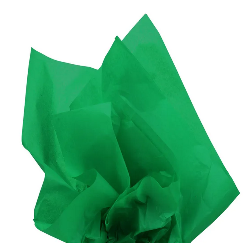 Kelly green tissue paper that is flared out as if stuffed into a gift bag.
