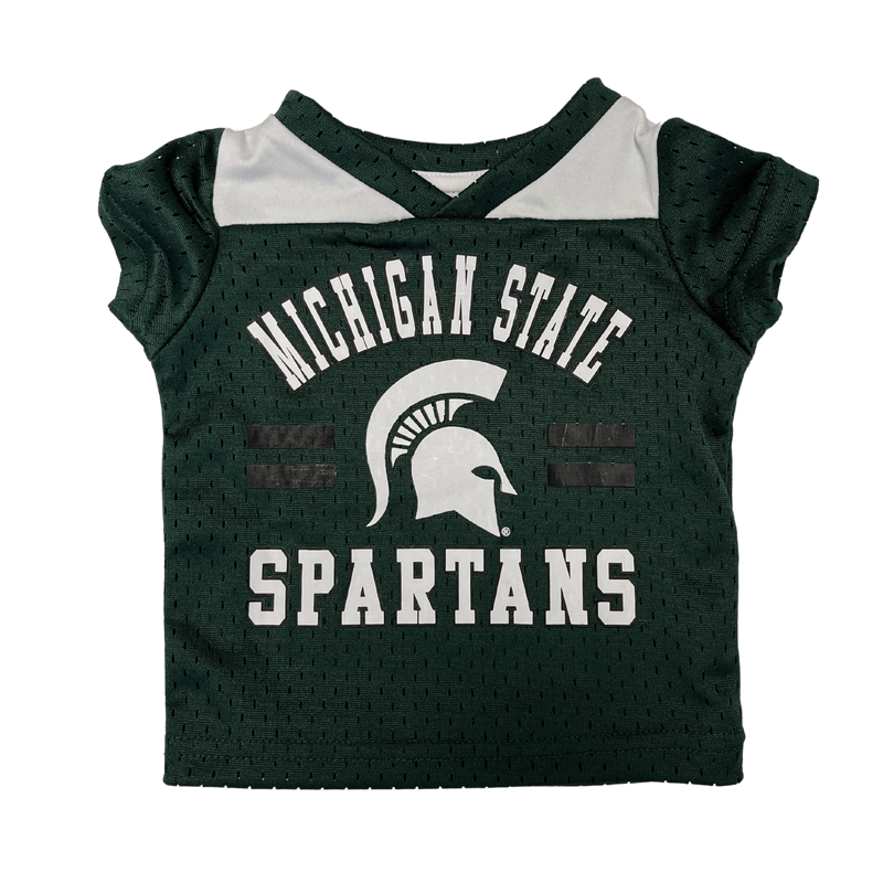 A toddler or infant sized green football jersey with Michigan State Spartans and the MSU helmet logo written on the front.