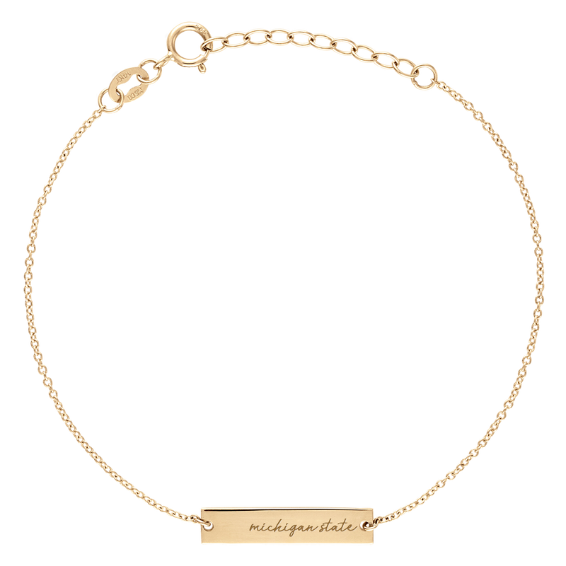 A gold, 7 inch cable chain bracelet with a small silver bar on it that reads Michigan State in cursive.