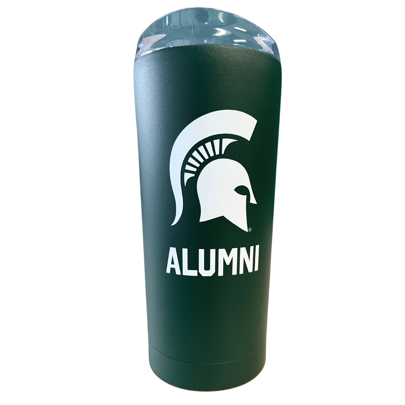 A dark green stainless steel tumbler with a white Michigan State Spartan helmet logo on the side. Underneath the logo in white, capital letters is the word Alumni. 
