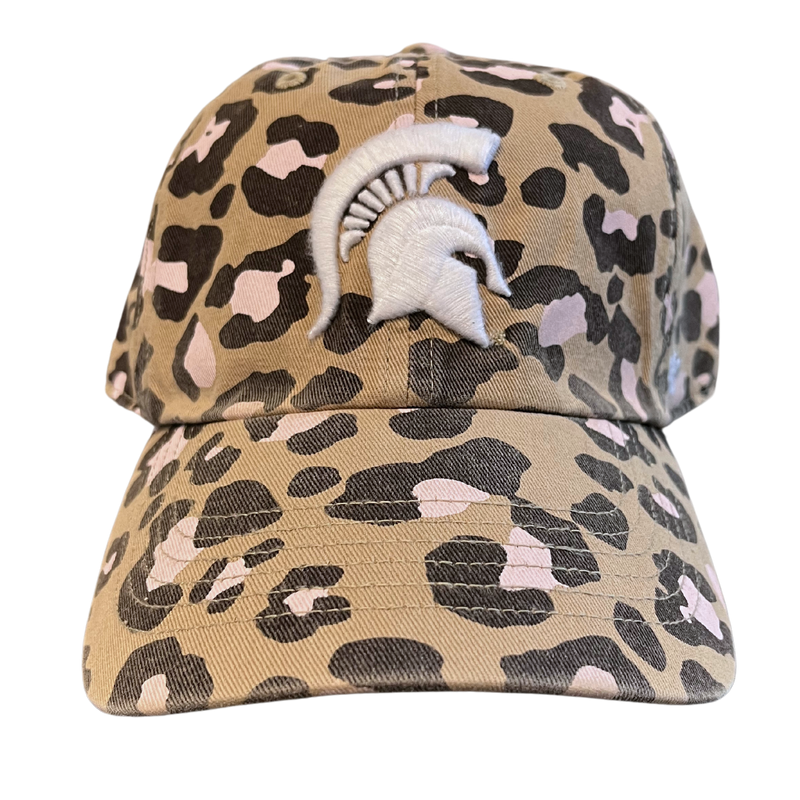 A head-on view of a khaki baseball cap composed of a dark brown and pink leopard print. On the front panel is an embroidered white Michigan State Spartan helmet logo.