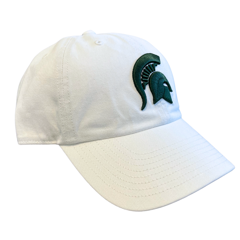 An angled view of a white ball cap with a dark green Michigan State spartan helmet logo embroidered on the center face of the hat.