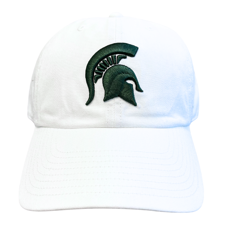 A head-on view of a white ball cap with a dark green Michigan State spartan helmet logo embroidered on the center face of the hat. On the left temple panel is a dark green embroidered '47 logo