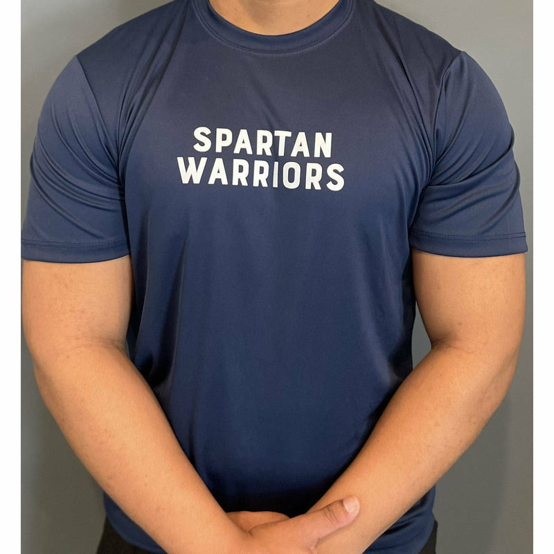 Man wearing a blue athletic t-shirt with Spartan Warriors written in white block text on the center chest.