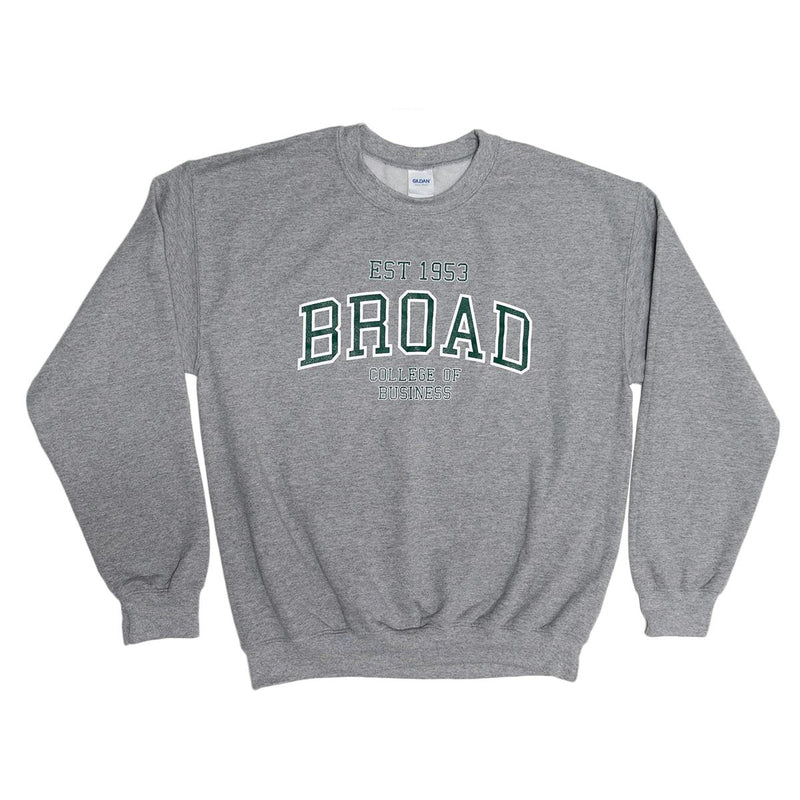 Heathered light gray crewneck sweatshirt. Across the center chest is athletic style green text with a white outline reading EST 1953 above arched text reading Broad. Below that are two lines reading "college of business" in the same font.
