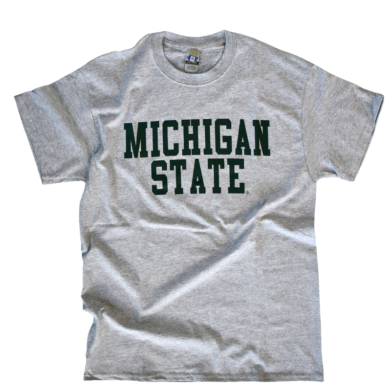 Light gray crewneck short-sleeve t-shirt. Across center chest, green block letters read "Michigan State"