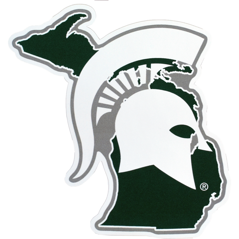Cutout decal in the shape of the state of Michigan (dark green) with a large white Spartan helmet overlaid. The entire decal is outlined in white with "dead space" in a medium gray.