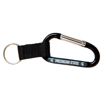 Black carabiner clip with a green oblong oval imprinted parallel to the opening. In the oval, white printing reads Michigan State with a Spartan helmet on either side. A black canvas loop hangs off one end with a silver keyring.