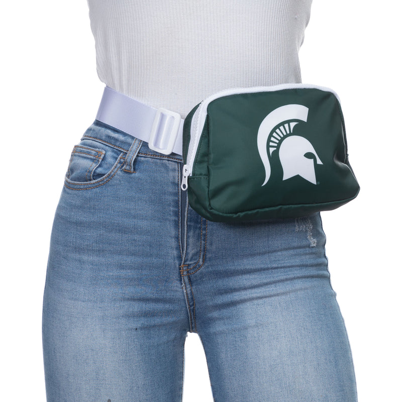 Woman's torso wearing the green fanny pack with white Spartan helmet logo on her left hip