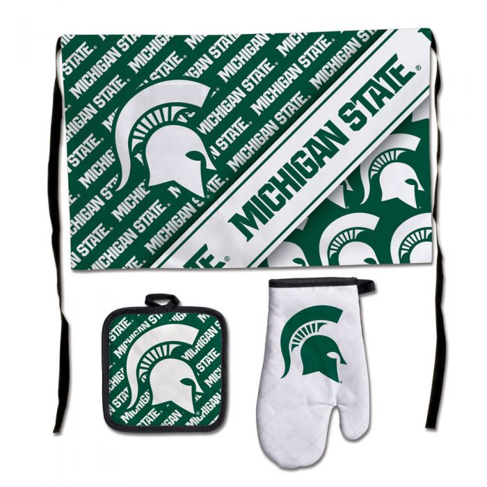 Side by side photos of the waist apron, pot holder and oven mitt. The pot holder is green with Michigan State in stylized text in a diagonal repeating pattern, and features a large white Spartan helmet.