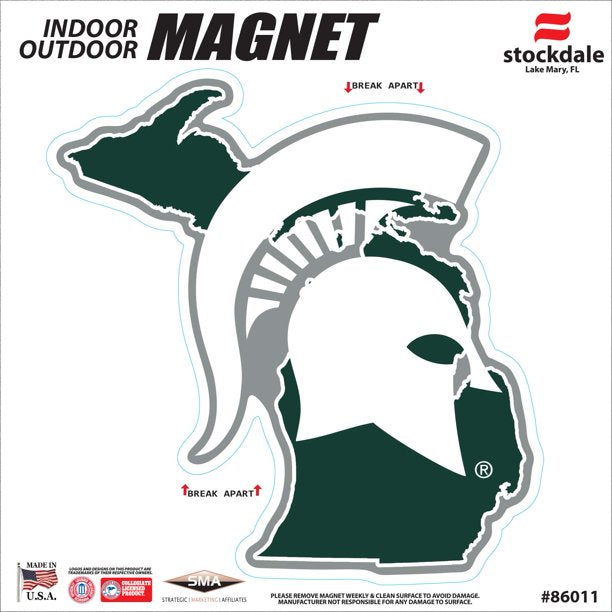 Cutout magnet in the shape of the state of Michigan (dark green) with a large white Spartan helmet overlaid. The entire magnet is outlined in white with "dead space" in a medium gray. Packaging reads "indoor outdoor magnet"