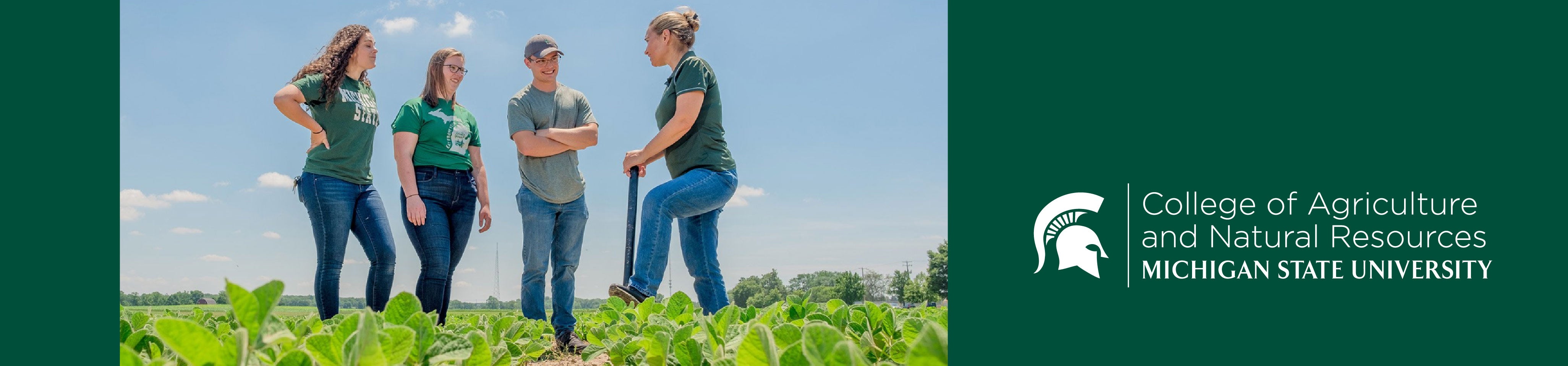 A group of agriculture and natural resources students listening to an instructor in a field of crops. To the left is the College of Agriculture and Natural Resources wordmark logo.