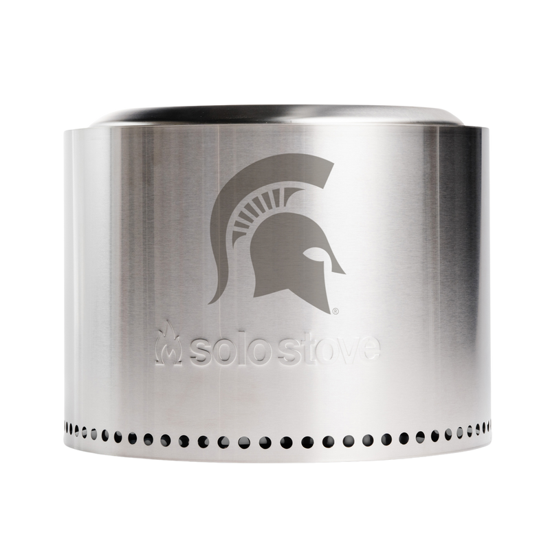 A stainless steel flameless portable bonfire kit with a MSU spartan helmet logo on the side. 