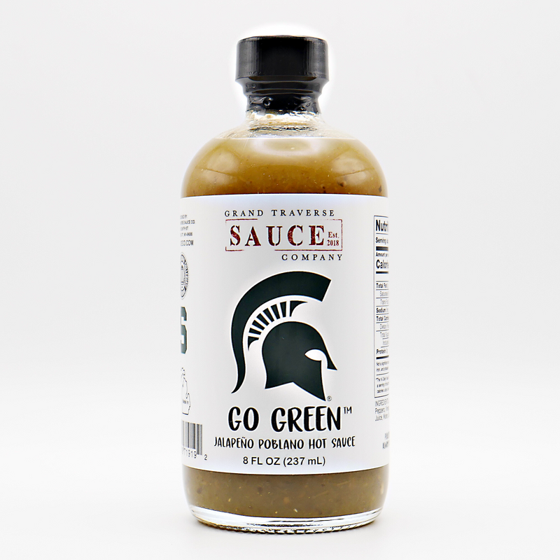 An eight ounce bottle of the Grand Traverse Sauce Company Go Green Hot Sauce