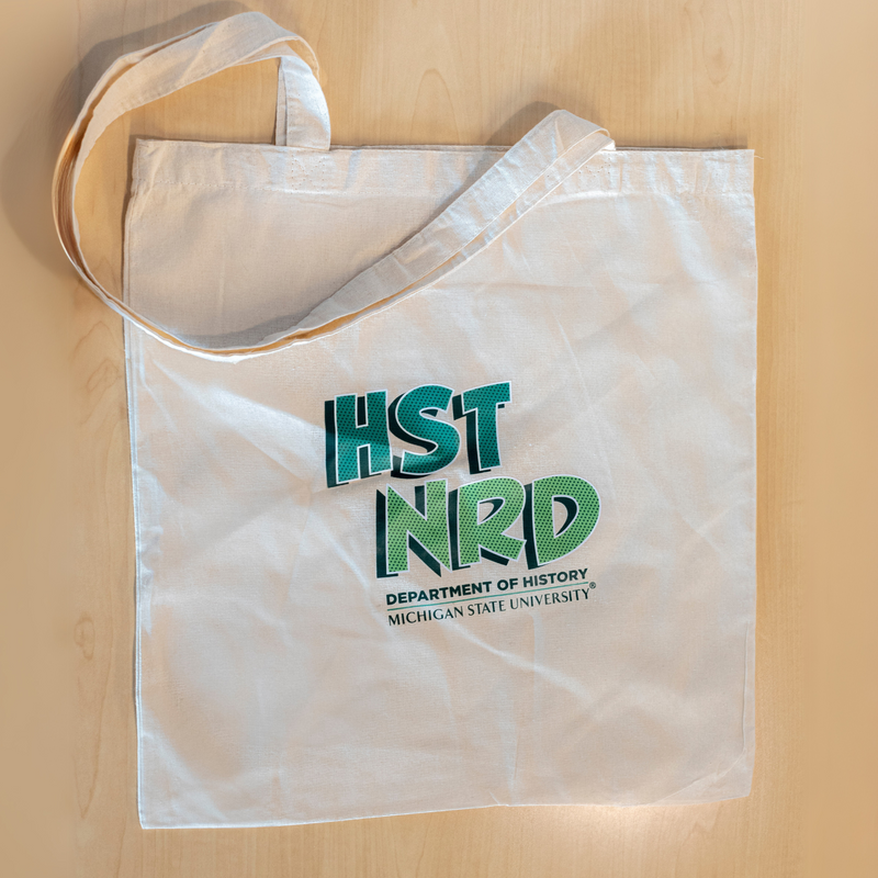 7" x 9" natural cotton tote bag with ‘HST NRD’ above ‘Department of History’ and ‘Michigan State University’.