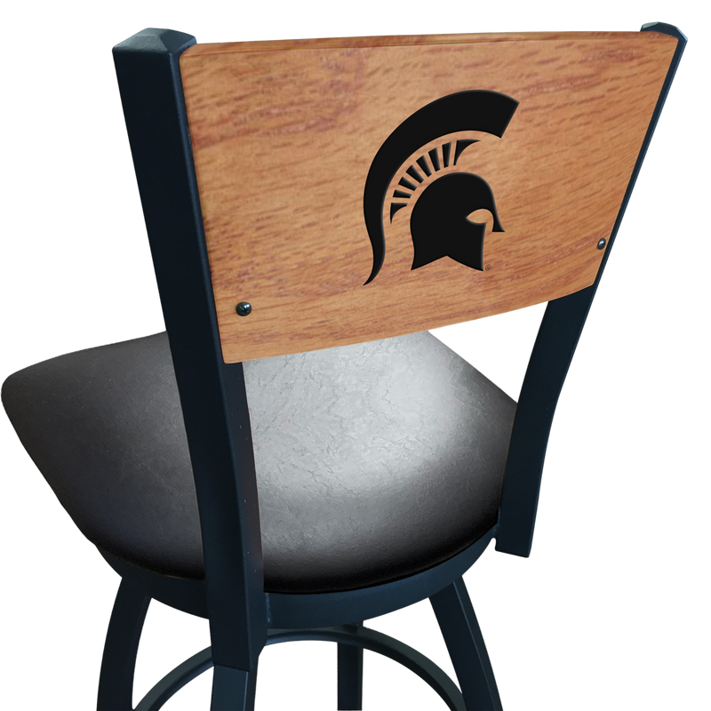 A black swivel bar stool with a black seat cushion and seat back with a wooden finish. Engraved in the seat back is a black MSU spartan helmet logo.