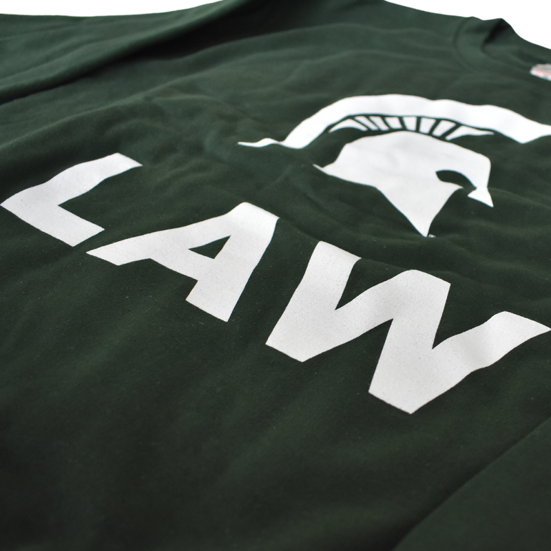 Close-up of the Spartan helmet and "Law" text graphic on the front of a dark green crewneck sweatshirt.