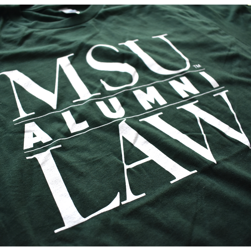Close-up of graphic text covering three lines that read MSU Law Alumni in all caps, with alumni being in the center separated by two thin white lines.