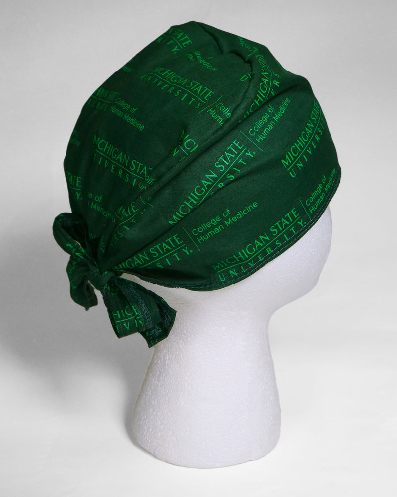 This custom designed College of Human Medicine logo patterned scrub cap is 100% cotton and proudly made in the USA. Proceeds support the College of Human Medicine Student Scholarship Fund.