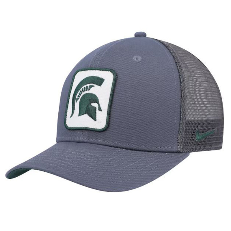 Gray Trucker hat with mesh side panels, white square patch center crown, outlined in dark green with a dark green Spartan helmet. Green Nike Swoosh on loser side front panel.
