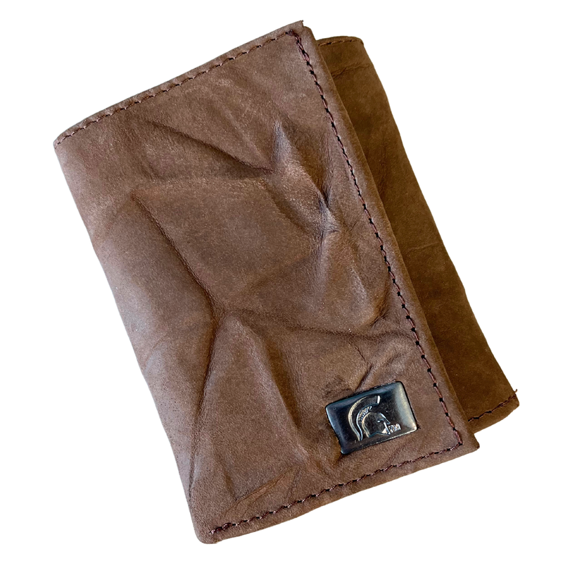 Front of a folded brown leather wallet with a silver rectangle in the bottom right corner of the front, embossed with a Spartan helmet.
