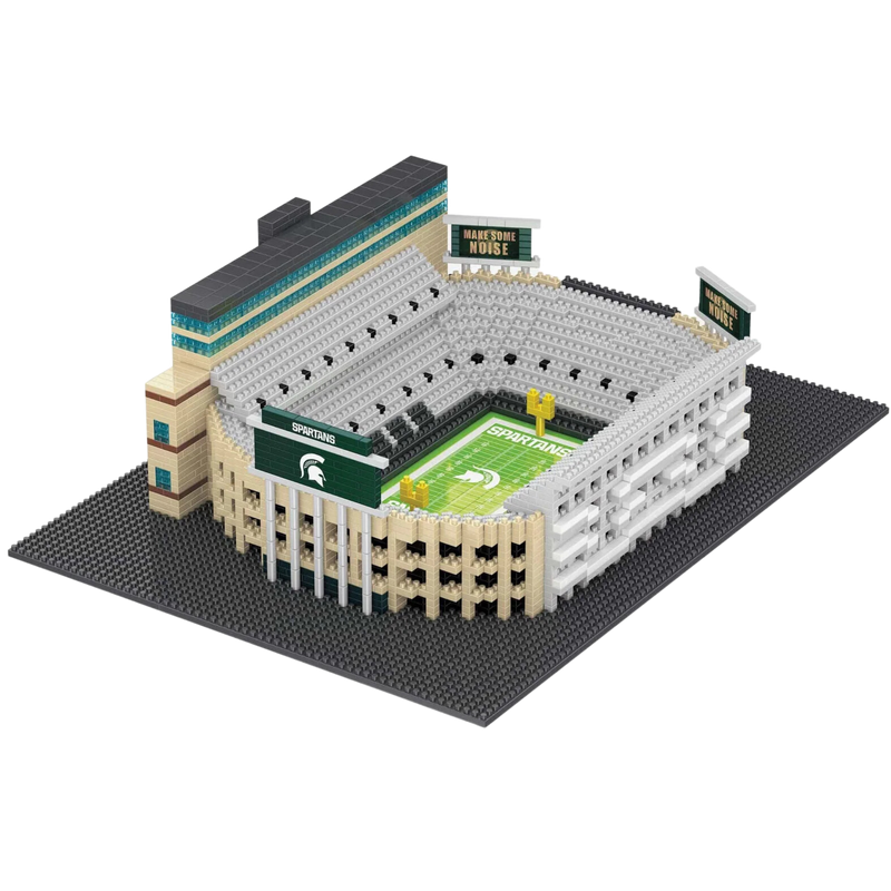 Aerial view of the assembled BRXLZ miniature Spartan Stadium from the shorter side of the stands. The visible scoreboards read make some noise.