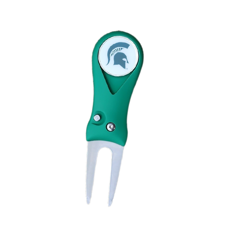 This golf ball repair tool includes a kelly green handle with silver prongs. A removeable magnetic golf ball marker is embedded in the handle, and is a white circle with a dark green Spartan helmet.