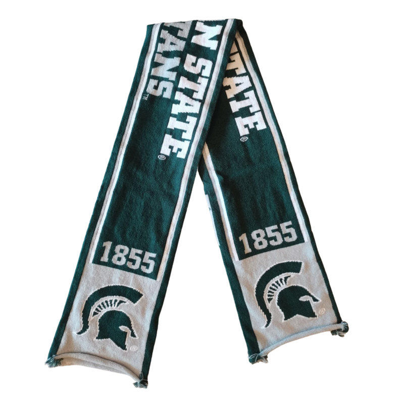 A gray and green scarf with "Michigan State Spartans" written in the center. On the end of each side of the scarf is the founding year of MSU, 1855, along with a green spartan helmet logo. 