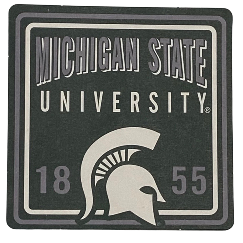 Square pulp board coaster in dark green, with a gray stripe around the far outside, an inner off-white stripe, and Michigan State University printed in gray and white. A large white Spartan helmet is at bottom with a gray 18 to the left of the helmet and 55 to the right