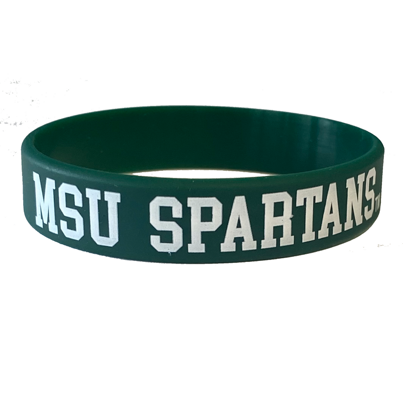 Dark green silicone wristband with "MSU Spartans" followed by a small trademark symbol printed on it in a white collegiate font.
