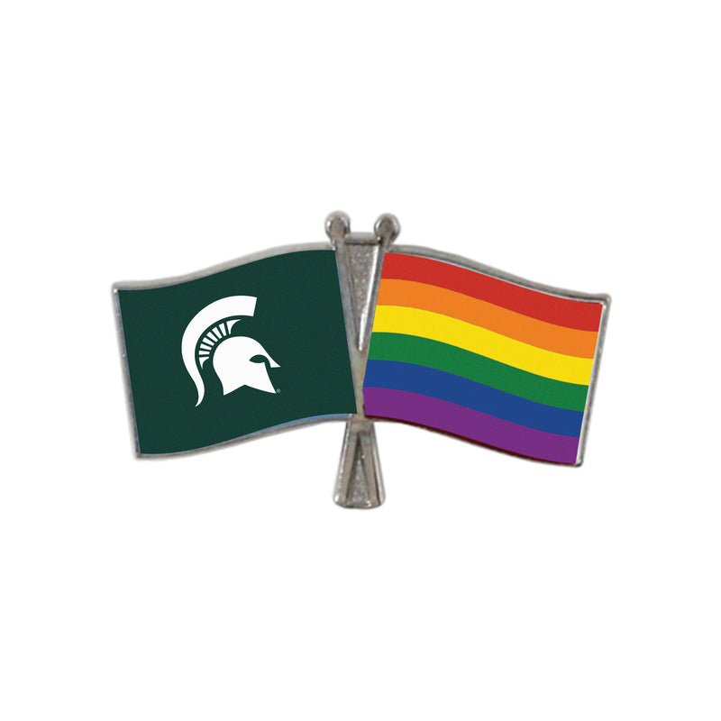 A chrome lapel pin featuring two flags with crossed poles. On the left is a dark green flag with a white Spartan helmet logo, and on the right is the 1979 six-color pride flag.