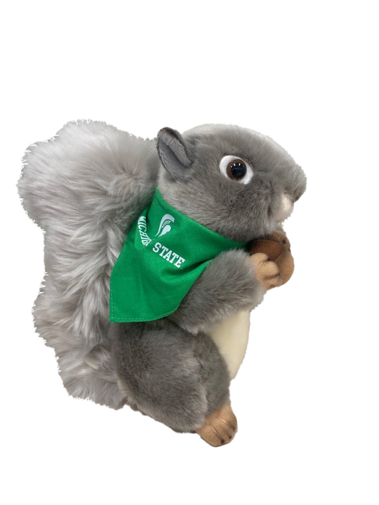 Gray plush squirrel holding an acorn and wearing a green Michigan State bandana.
