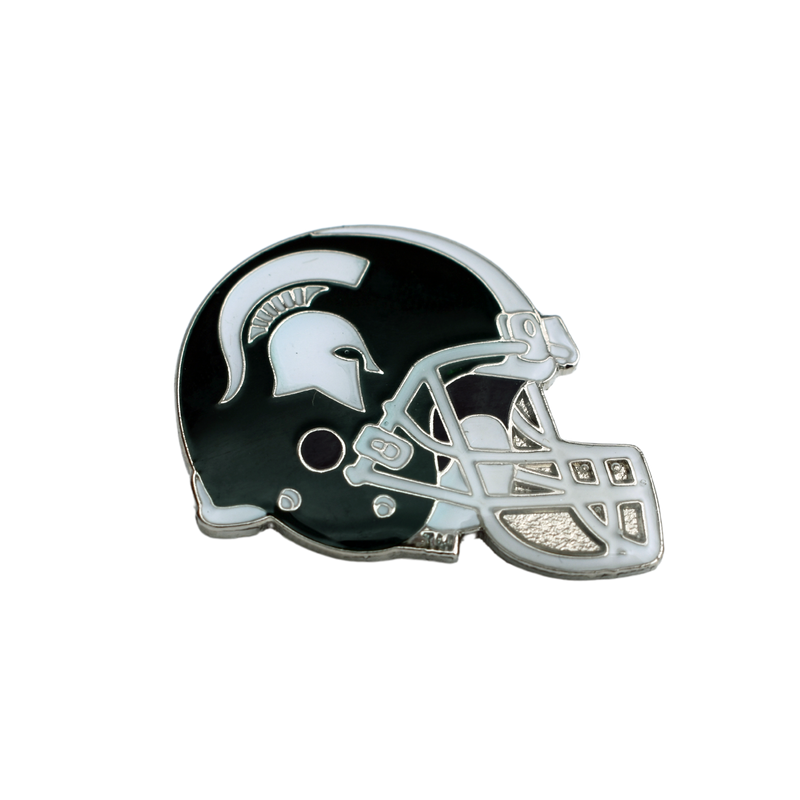 Silver metal is cutout in the shape of a football helmet and enameled in dark green and white following the MSU classic helmet style.