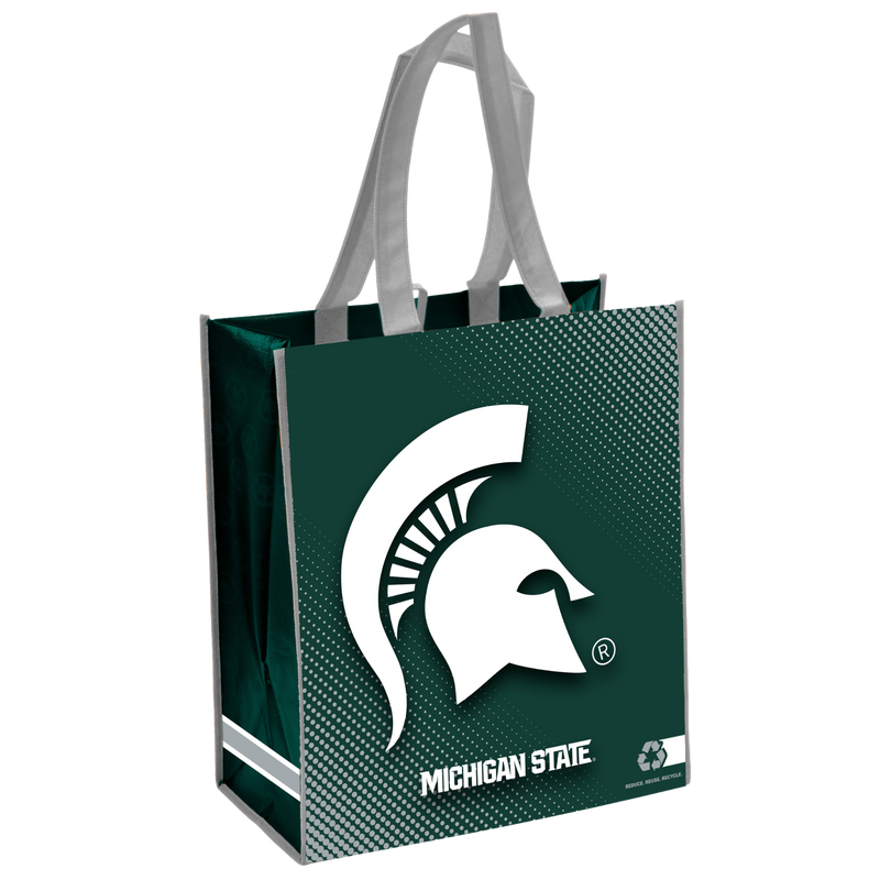 A dark green rectangular tote bag with gray piping on the corners and gray handles. On the front between two diagonal sets of fading gray dots is a large white Spartan helmet at a slight angle above athletic font reading “Michigan State.” A reduce, reuse, recycle icon is on the bottom right corner, and the sides feature a gray and white stripe near the bottom.