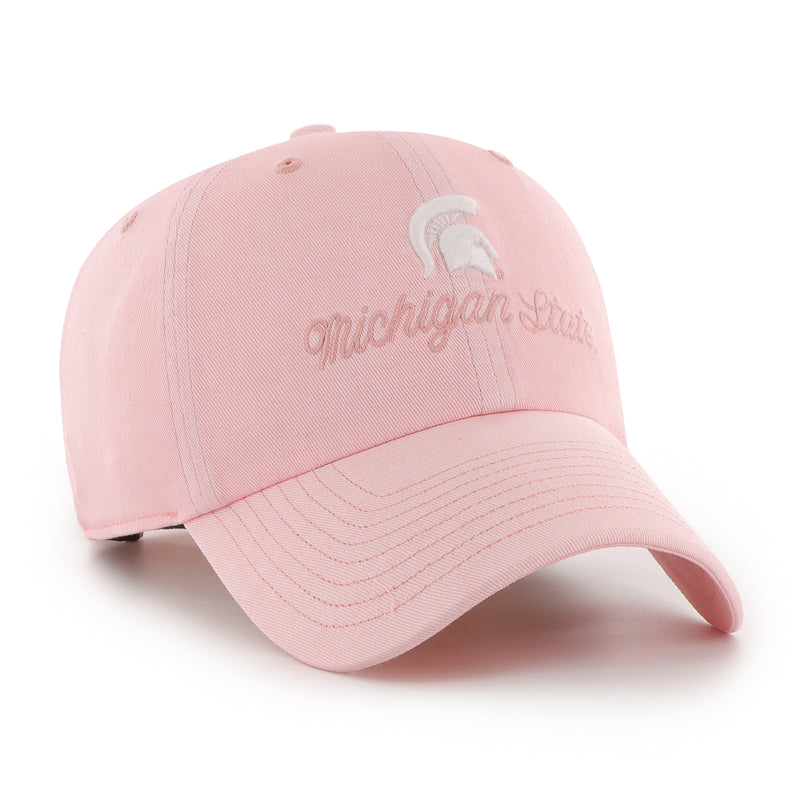 Unstructured pink baseball cap with a curved bill with large dark pink embroidered Michigan State script on the front under embroidered Sparty Helmet image, with adjustable fabric closure.