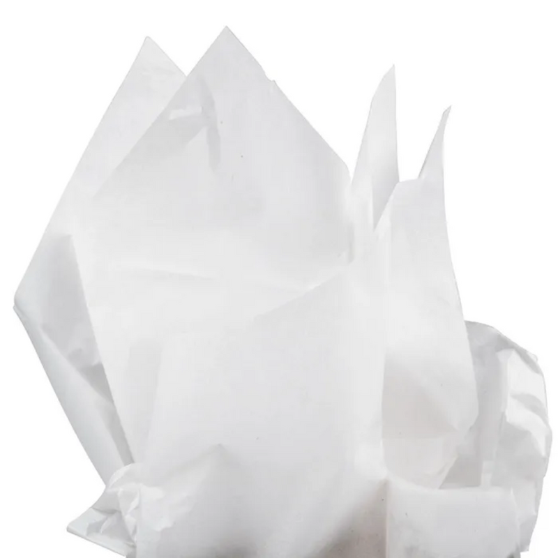 Bright white tissue paper that is flared out as if stuffed into a gift bag.
