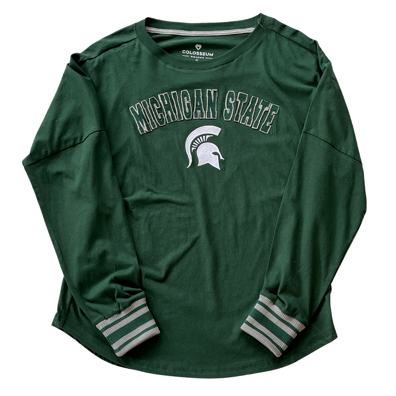 A green long-sleeve tee shirt. The chest has Michigan State written in all caps with a white MSU spartan helmet logo underneath. The sleeve cuffs alternate colors of green and grey. 