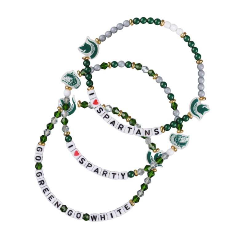 Beaded bracelets, alternating green, white and clear beads. Two bracelets have two Spartan helmet charms (one has lettering I "heart" Spartans, other has go green, go white) and the third has two retro Sparty charms, with lettering that reads I "heart" Sparty.