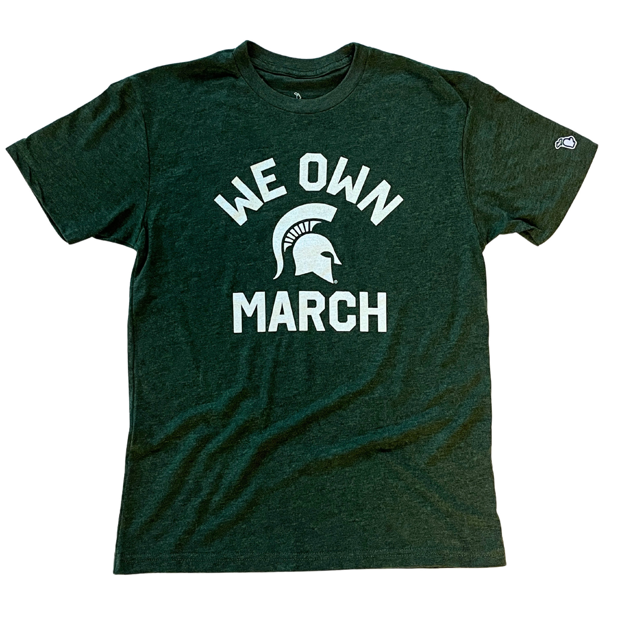 Green t-shirt with a white Spartan helmet logo in the center with white lettering "We Own" above and "March" underneath.