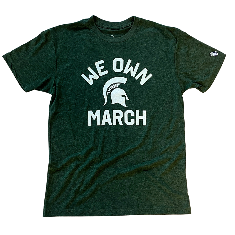 Green t-shirt with a white Spartan helmet logo in the center with white lettering "We Own" above and "March" underneath.