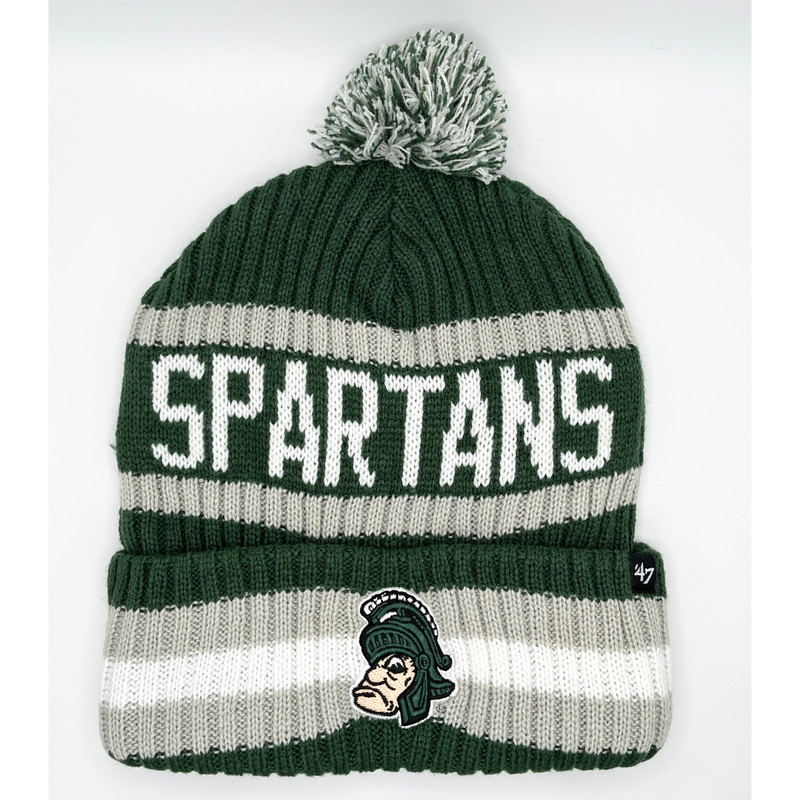 A dark green, gray, and white pom beanie with a gruff Sparty logo on the front. On the top portion of the beanie is the word "Spartans" written in all caps in white. 