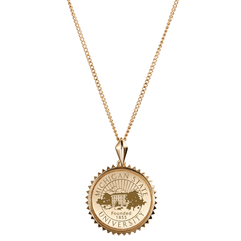 A gold, chain link necklace with a medallion styled to look like a coin. Around the medallion are outward facing triangles to make the coin medallion resemble a sun. In the middle of the medallion is the MSU seal.
