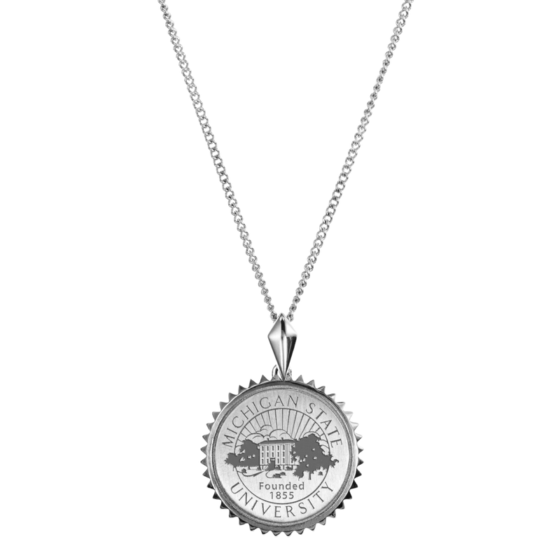 A sterling silver, chain link necklace with a medallion styled to look like a coin. Around the medallion are outward facing triangles to make the coin medallion resemble a sun. In the middle of the medallion is the MSU seal. 