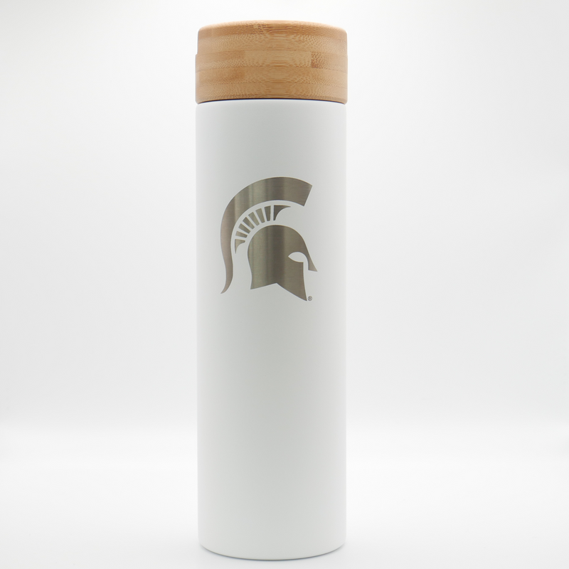 Cylinder powder coated white tumbler. Bamboo lid. Spartan helmet design etched vertically on body of tumbler. Stainless steel infuser basket inside.