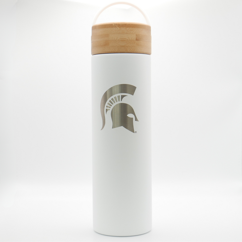 Cylinder powder coated white tumbler. Bamboo lid. Spartan helmet design etched vertically on body of tumbler. Stainless steel infuser basket inside.